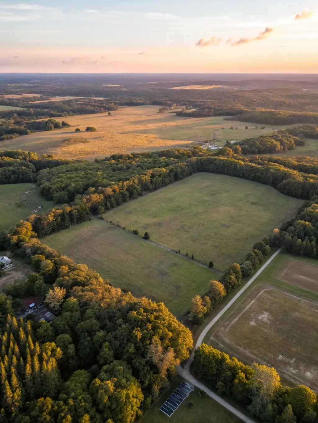 An aerial view of a prime piece of land secured by JD Land Ventures, showcasing its potential for development and investment.